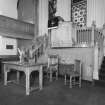 Interior. View showing pulpit, communion table and chairs