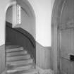 Interior. View of entrance lobby and stairs