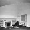 Interior, view of vaulted basement original kitchen now with marble fireplace