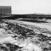 Pier and warehouse from east