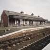 View of S-bound platform, offices and awning from NW