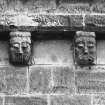 Detail of two corbels on south wall of chancel