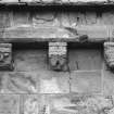 Detail of three corbels on north wall of chancel