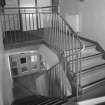Interior view of 1935 Barrack Block showing stairwell and first floor landing.