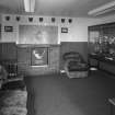 Interior view of 1935 Barrack Block showing 'Trpohy Room of Golf and Police Clubs.
