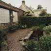 Pond (with Portuguese tilework on adjacent wall), view from NW