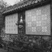 Portuguese tilework on wall adjacent to pond, detail