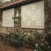 Portuguese tilework on wall adjacent to pond, detail