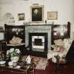 Ground floor, library, view of fireplace and panelled surround