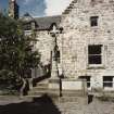 All Saints Episcopal Church.  
North East courtyard, view of war memorial from South.