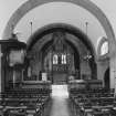 All Saints Episcopal Church, interior.  
View of crossing and chancel from West.