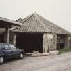 View from SE of horse engine house with waterwheel house on left side
Photographed 9 May 1994