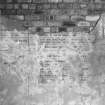 Interior.
Detail showing remains of data table painted on plaster of wall, providing details of attacks on enemy shipping.