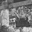 Detail of carved fragments built into North gable wall of 30 Low Street.