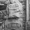 Detail of sculpted figures and separate stone, dated 1628, at 30 Low Street.