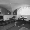 Basement view of vaulted sitting room