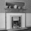 Detail of fireplace in basement