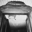 Interior.
Detail of original entrance doorway showing lugged stone architrave.