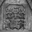 View of East armorial panel on mausoleum wall.