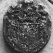 View of armorial panel on West wall of mausoleum.