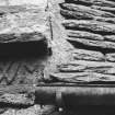Detail of skewputt on South-West angle.
Insc: 'I.M'.