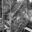 Fyvie Castle.
View of turret adjacent to North East re-entrant of Meldrum Tower showing roof raggle and blocked window during restoration.