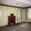 Interior.View of ground floor South room/ parlour from North showing the fireplace and panelling