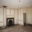 Interior.View of ground floor /North room dining room from South showing sideboard recess, fireplace and panelling