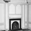 Interior.View of ground floor /North room dining room from South showing fireplace and panelling