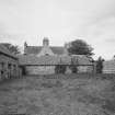 View of courtyard from East with house beyond