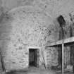 Interior view from W of W half of vaulted chamber forming ground floor of S part of main building, referred to as ?ice house?