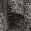 Detail of base of turret in re-entrant angle of tower and South range.