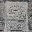 Detail of armorial panel on West wall of square tower, North-East re-entrant angle of courtyard.