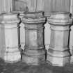 Detail of chimney pots stored in study
