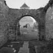 Remains of church, arched doorway, view from east