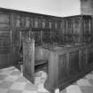 Interior. View of 1903 choir stalls and re-used panelling