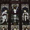 Interior. Detail of E stained glass window medieval tracery with stained glass by C E Kempe