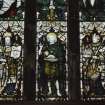 Interior. Detail of E stained glass window medieval tracery with stained glass by C E Kempe