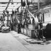 Aberdeen, Grandholm Works, interior.
Wool scouring; general view of feed end of wool scouring plant in building 2.