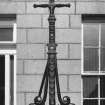 Aberdeen, 4 Golden Square.
Detail of cast iron lamp standard incorporated in railings outside no.4 Golden Square.