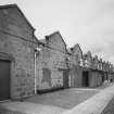 Aberdeen, Grandholm Works.
General view from South-West of weaving, warping, winding departments, showing sequence of coped gable ends.