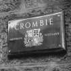 Aberdeen, Grandholm Works.
General view of name plaque.
Insc: 'Crombie. Aberdeen. Scotland.'