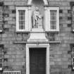 View of statue of Robert Gordon above the main door.