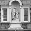 View of statue of Robert Gordon above the main door.