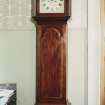 Interior. View of grandfather clock.