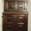 Interior. View of carved oak cabinet.