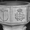 Font from Kinkell Old Parish Church now in St John's Episcopal Church, Aberdeen.
Detail of panels displaying a) shield charged with the Crown of Thorns suspended from the Cross, and b) the crowned monogram IHS.
