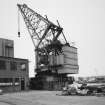 Aberdeen, York Place, Hall Russell Shipyard.
General view from North of quayside crane on West side of building hall. Crane was made by Sir William Arrol and company of Glasgow in 1930. (SWL 65 tons at 75 ft radius, 45 tons at 84 ft radius).