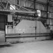 Aberdeen, York Place, Hall Russell Shipyard.
General interior view from North-West in bay 2 of platers' shop, showing hydraulic plate bending machine made by Hugh Smith of Glasgow. (Bed-Length 9.2m).