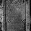 Inveraray, Kilmalieu Burial Ground.
View of table-tomb of Robert Brown, 1699. Slab with scales and the merchants"4m" sign (the arms of the Stirling Guildry). Insc: 'Heir Lyes Robert Brown Merchand In Inveraray Who Ended This Life The 2 Of Mey 1689. His Age 42 Year. And Mary Sym. His Spouse Who Died The 18 Of March. 1722. And Of Her Age The 61 Year. 1699. And Martha Brown Relet pf the Deceased Alex ander Duncanson Esq. of Keills Aged 92, and died the 22d day of janauary 1784, years'